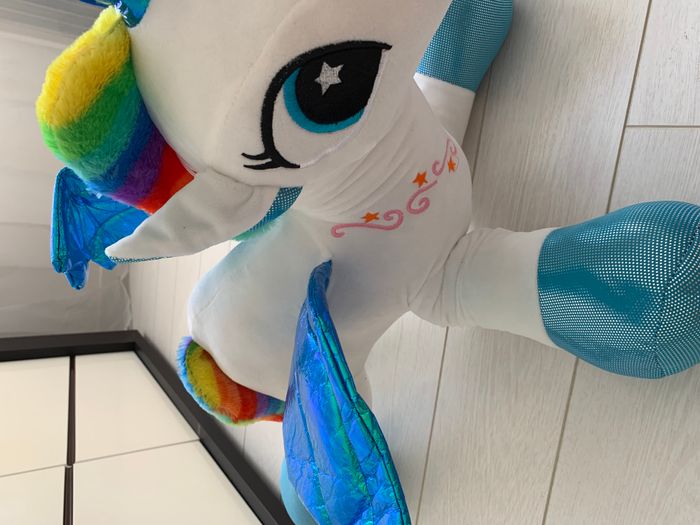 Licorne en peluche grand format multicolore avec étoiles filantes brodées - photo numéro 5