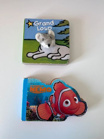 Lot de 2 livres le monde de Nemo et grand loup