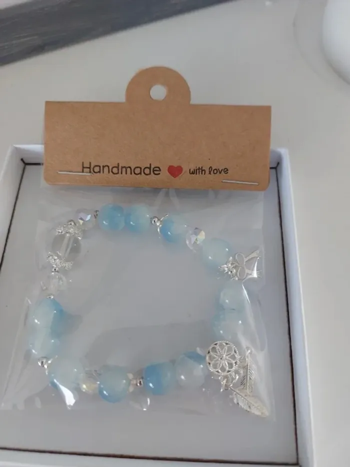 Jolie bracelet perles en verre craquelés bleu - photo numéro 3