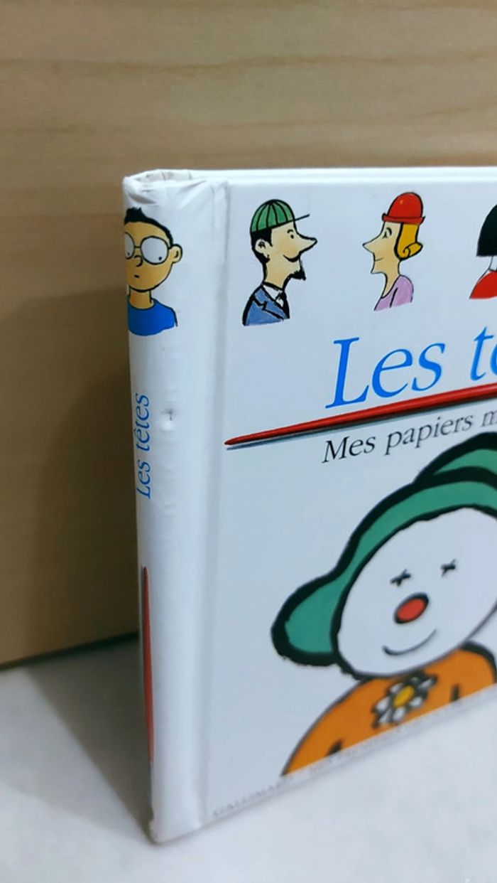 📕 Livre mes premières découvertes : Les têtes, mes papiers magiques - photo numéro 6