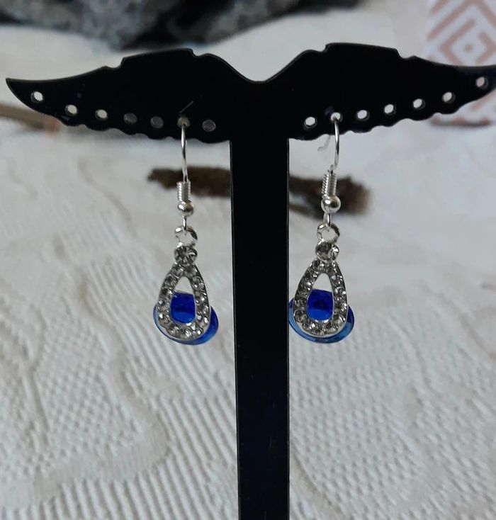 Lot bague et boucle d'oreille toute neuve