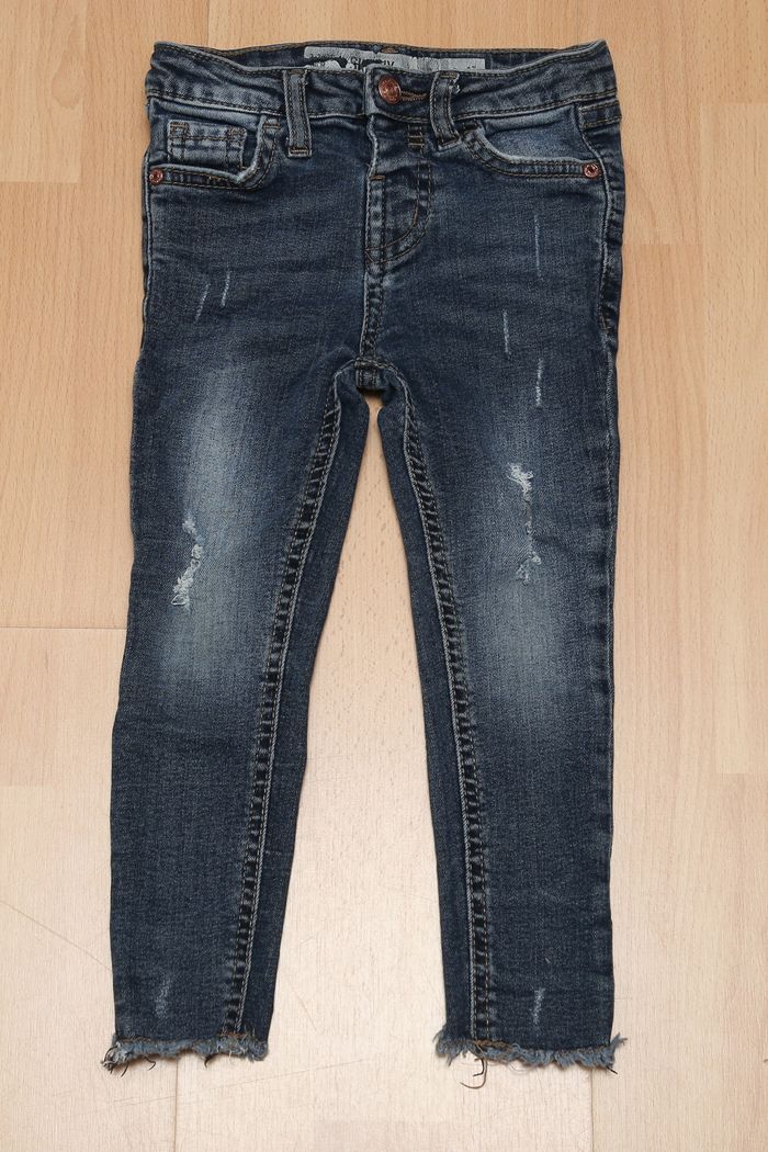 Jean skinny troué