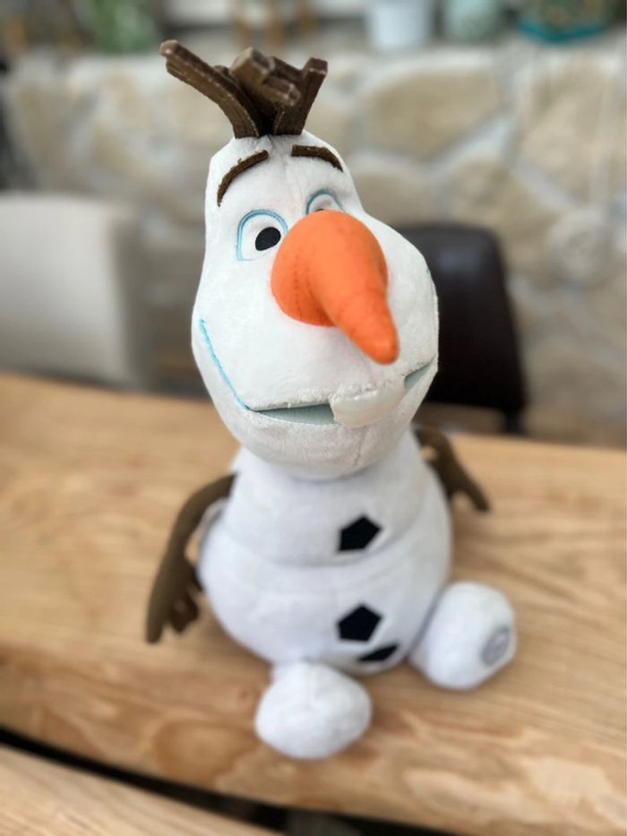 Peluche Olaf Disneyland Paris Disney bonhomme de neige La reine des neiges store