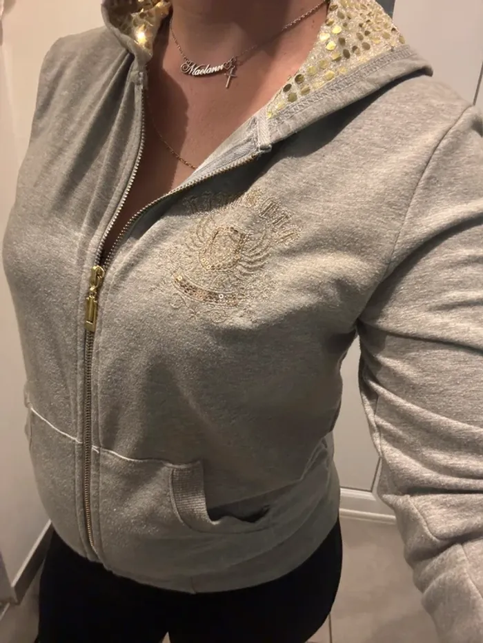 Veste à capuche pailletée