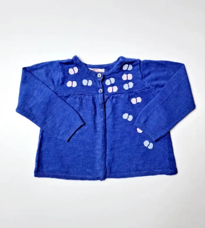 Gilet avec papillons cousus