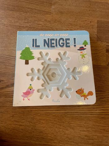 Livre cartonné se page en page Il neige !