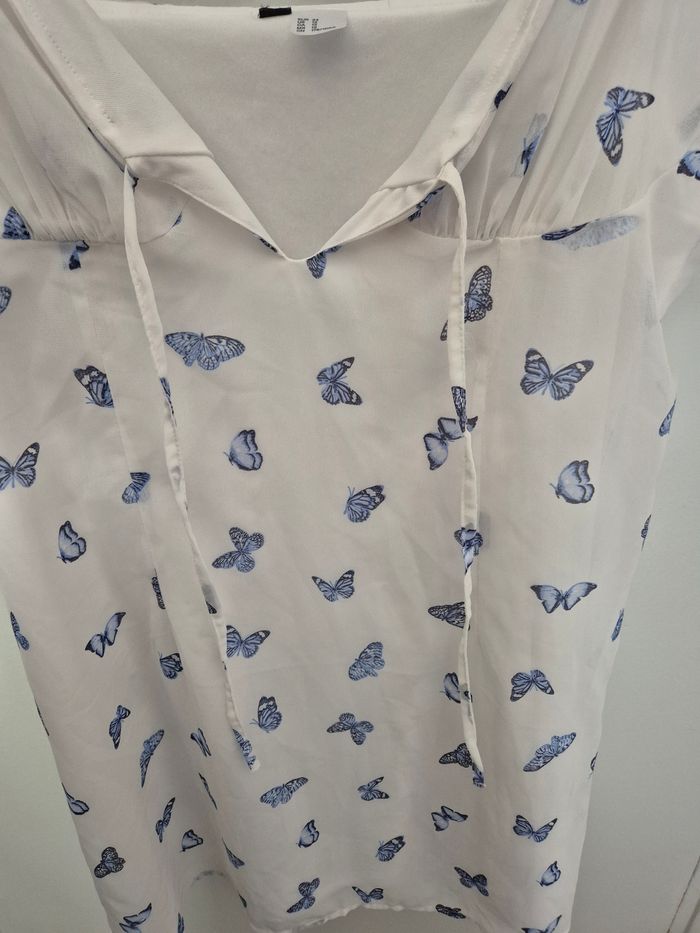 Magnifique robe taille 44 fermeture sur le cote avec papillon - photo numéro 4
