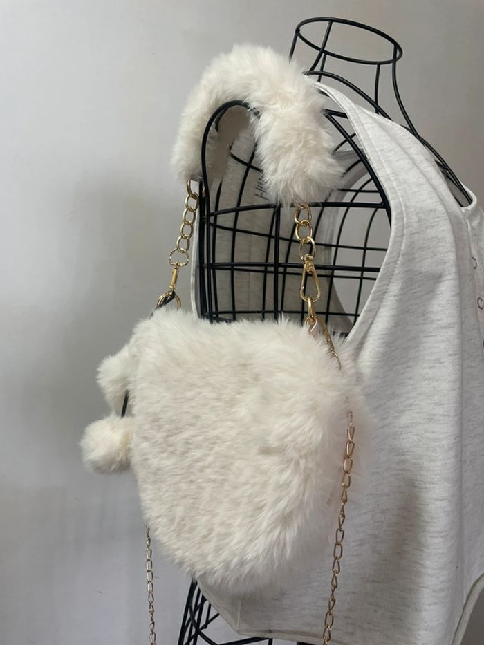 Sac à main élégant en fourrure synthétique avec poignée supérieure et bandoulière