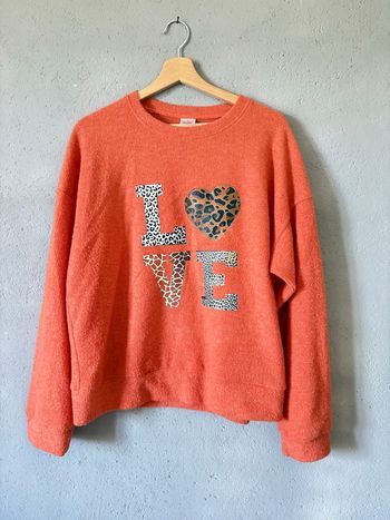 Pull corail taille L