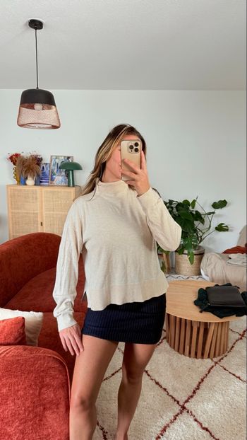 Pull beige col roulé