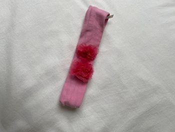 Bandeau rose avec fleurs orchestra