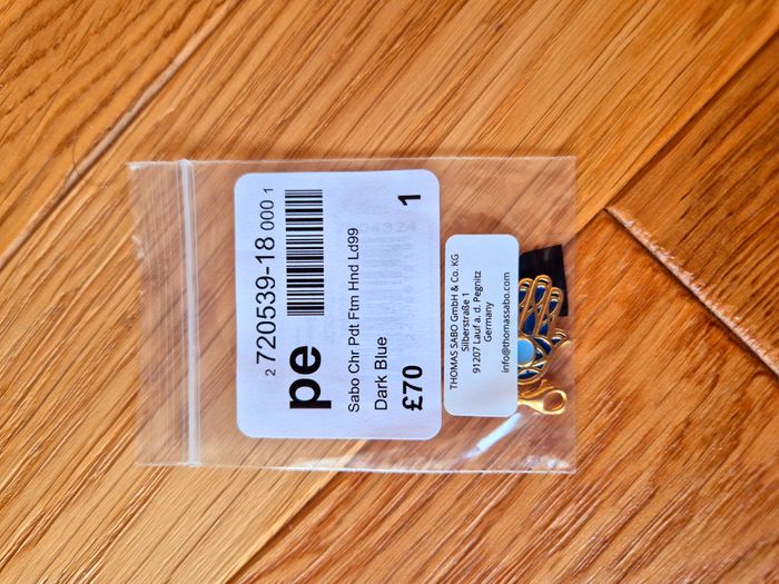 Pendentif Charm "Thomas Sabo" Main de Fatima plaqué or neuf dans blister. - photo numéro 9