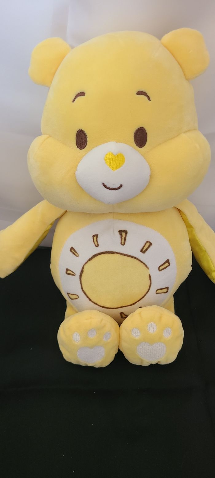 Doudou ours jaune soleil grosjojo Bisounours CARE BEARS BABY - photo numéro 2