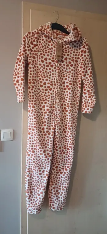 Pyjama style combinaison à tirettes . Tape à l'œil 12 ans .