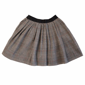 Jupe, 8 ans motif écossais, ceinture à paillettes argentées. 