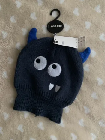 Bonnet enfant monstre bleu marine tu Hema😺