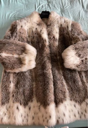 Manteau Olympia Limited Inc