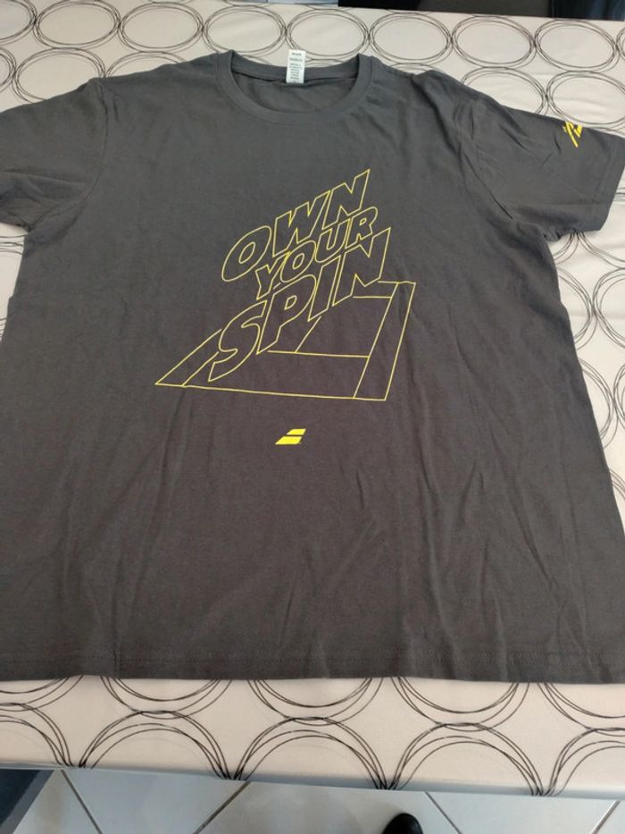 Tee shirt Babolat L complètement neuf
