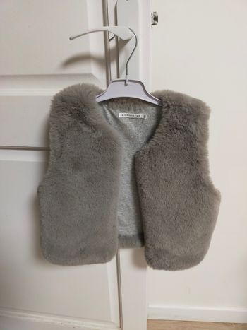 Gilet fausse fourrure monoprix 10 ans.