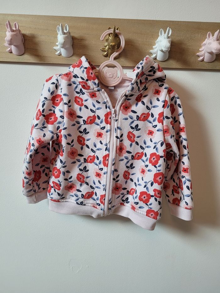 Gilet/sweat à capuche fleuri