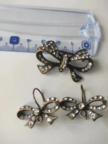Parure broche et BO noeuds Neufs