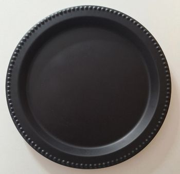 Grand plat rond noir en métal