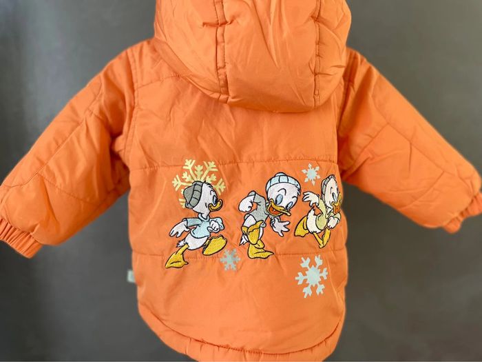Manteau orange Disney bébé - photo numéro 4