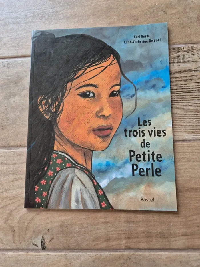 Livre les trois vies de Petite perle Carl Norac