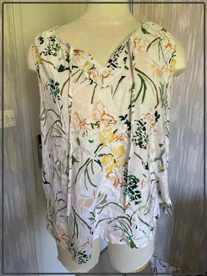 Très jolie blouse taille 42 *