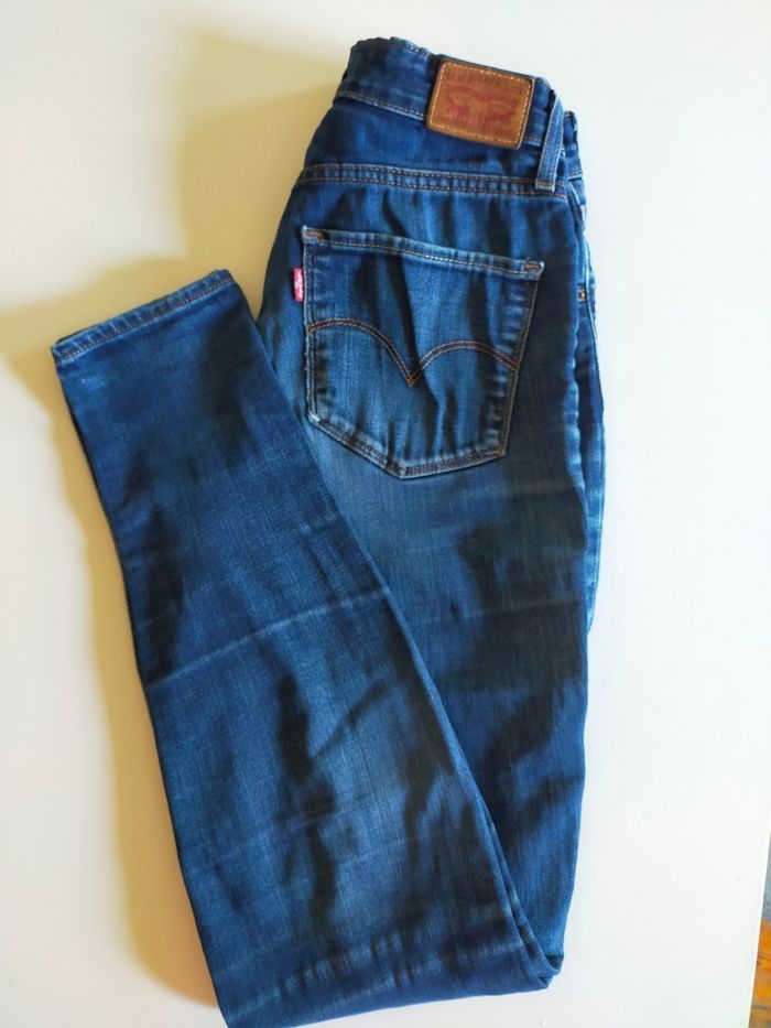 Jean  bleu Levi's taille haute  femme taille 27 skynny