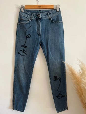 Jean slim/skinny à motifs visage Moschino Couture