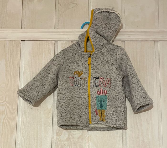 Gilet à capuche doublé sherpa