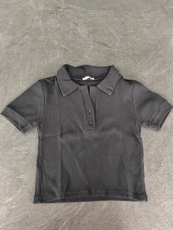 Top court noir Taille 14 ans Excellent état