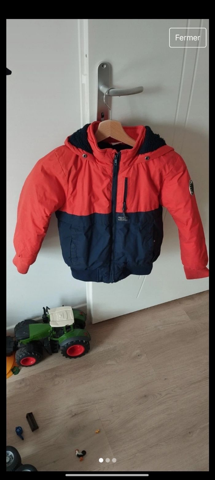 Manteau tape à l'oeil