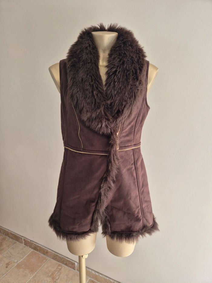 Manteau sans manches faussefourrure