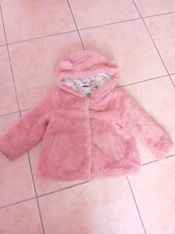 Manteau à fourrure rose