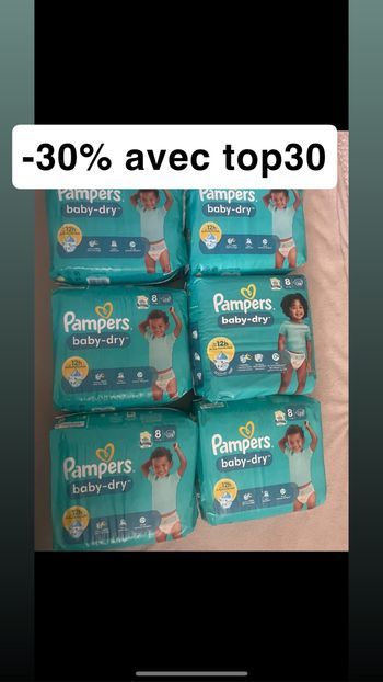 Six paquets de couches Pampers taille 8