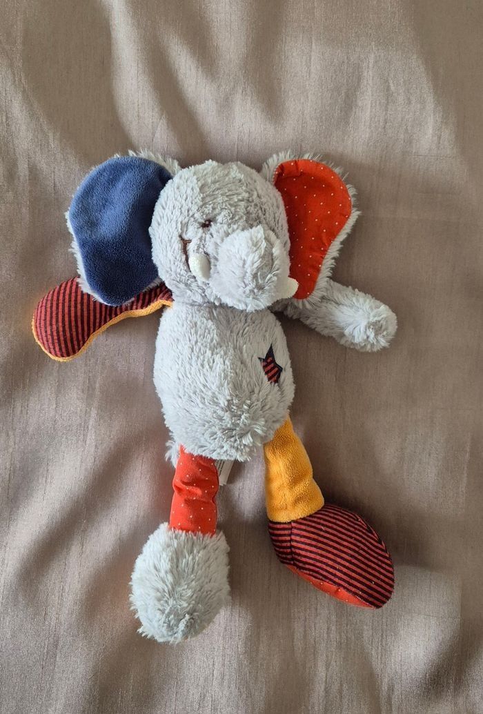 DOUDOU ÉLÉPHANT GRIS ROUGE JAUNE BLEU ÉTOILE TAPE A L'OEIL - photo numéro 2