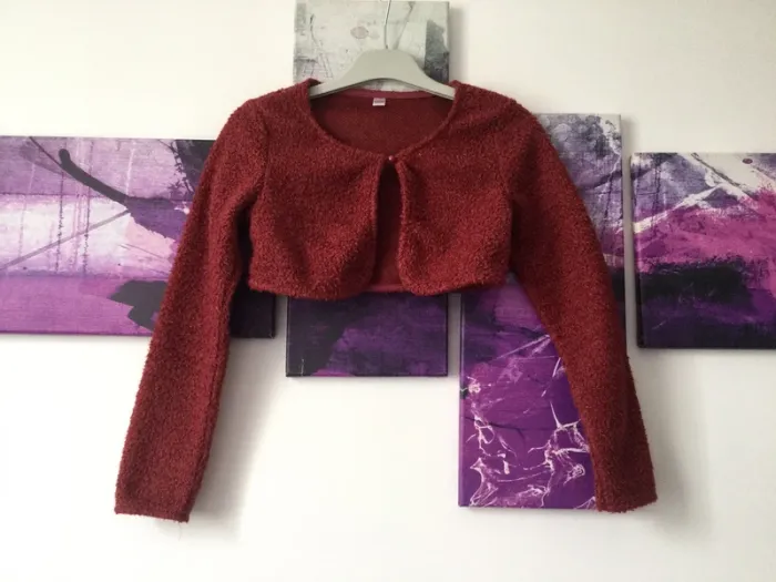Boléro couleur rouille 9-10 ans