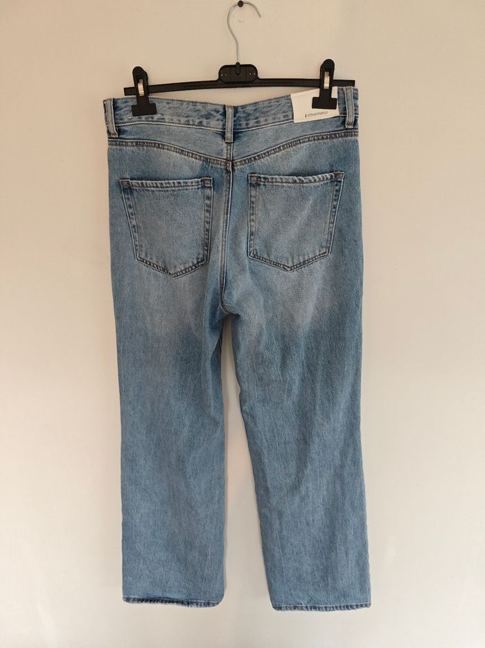 Jeans bleu troué parte éléphant Taille 38 - photo numéro 3