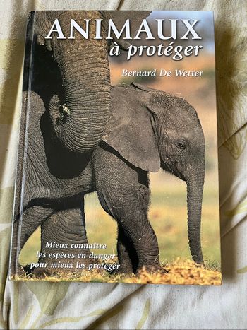 Livre. Animaux à protéger neuf