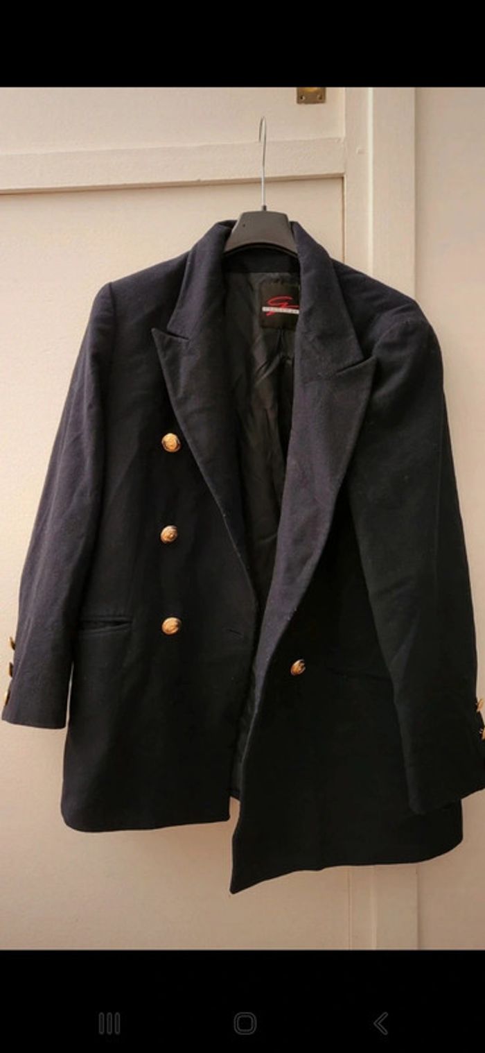 Veste noire à boutons