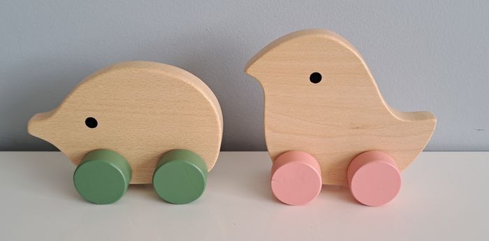 2 animaux à roulettes en bois