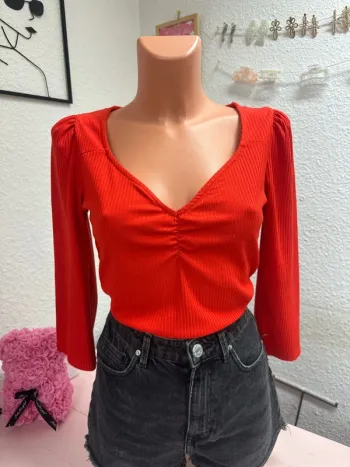 Joli haut rouge orangé taille S Mosquitos