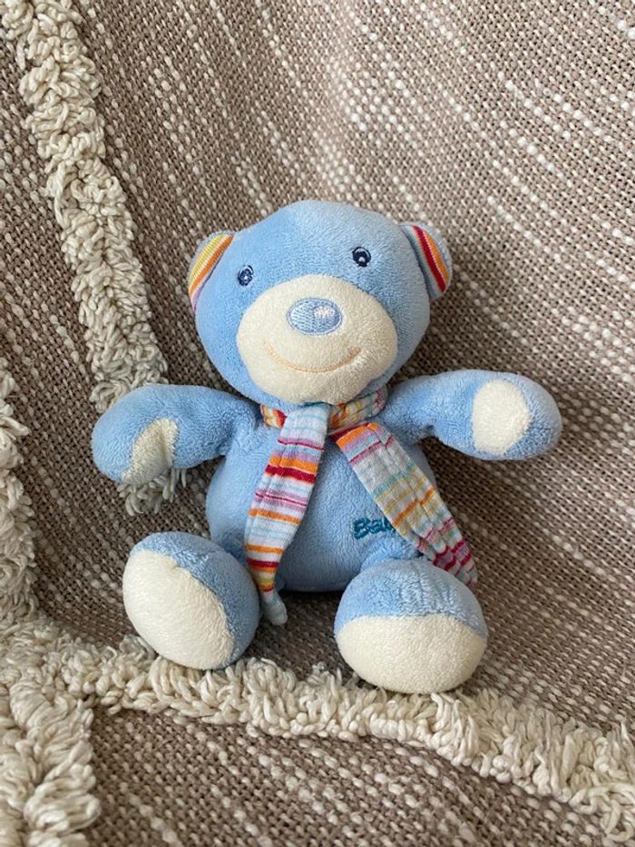 Peluche doudou 15cm babysun ours bleu blanc écharpe rayé rouge très bon état