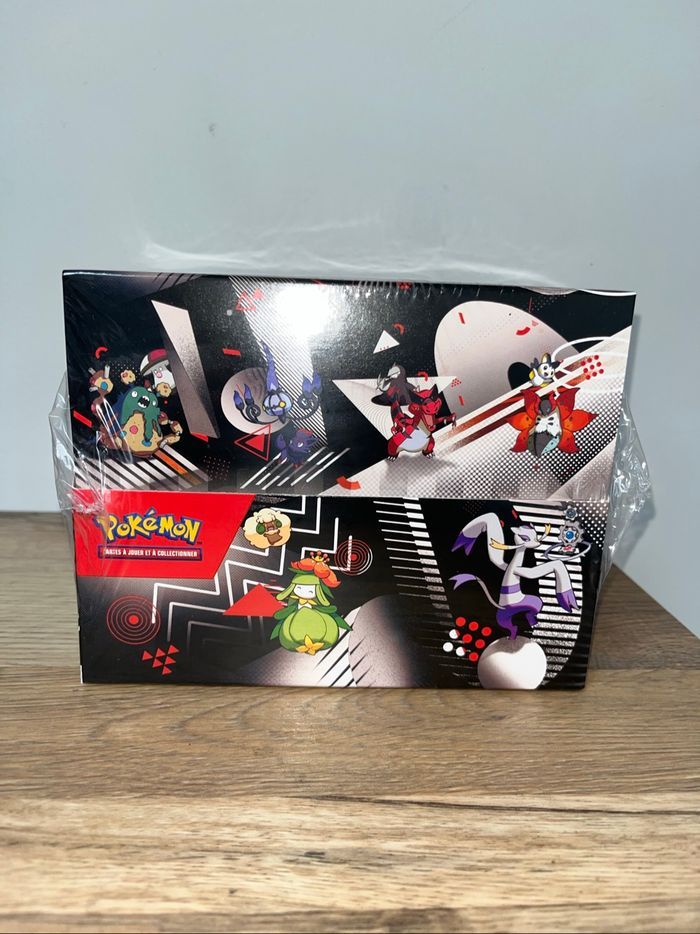 Display scellée mini tin foudre noire flamme blanche 10.5