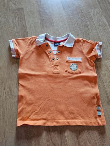 Polo orange 2 ans