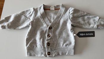 Gilet gris à boutons