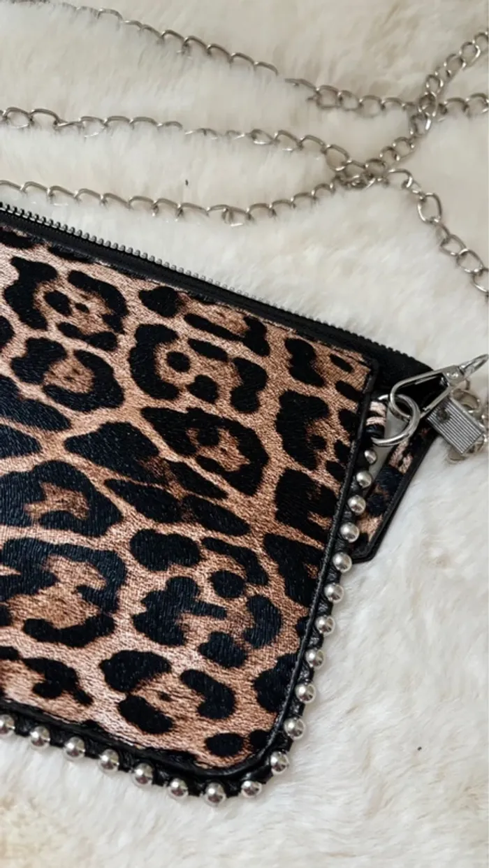 Sac à main / pochette motifs léopard - photo numéro 2