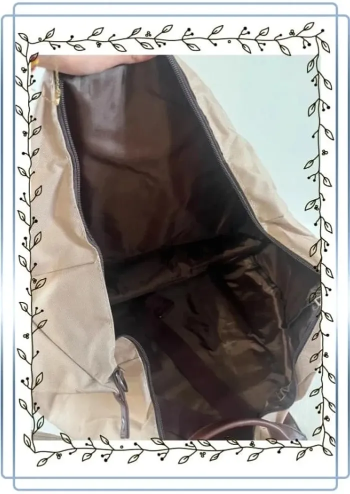 Sac à main bagage, grande taille, neuf sans étiquette, un tout petit trou sur le coté 75x40cm - photo numéro 5